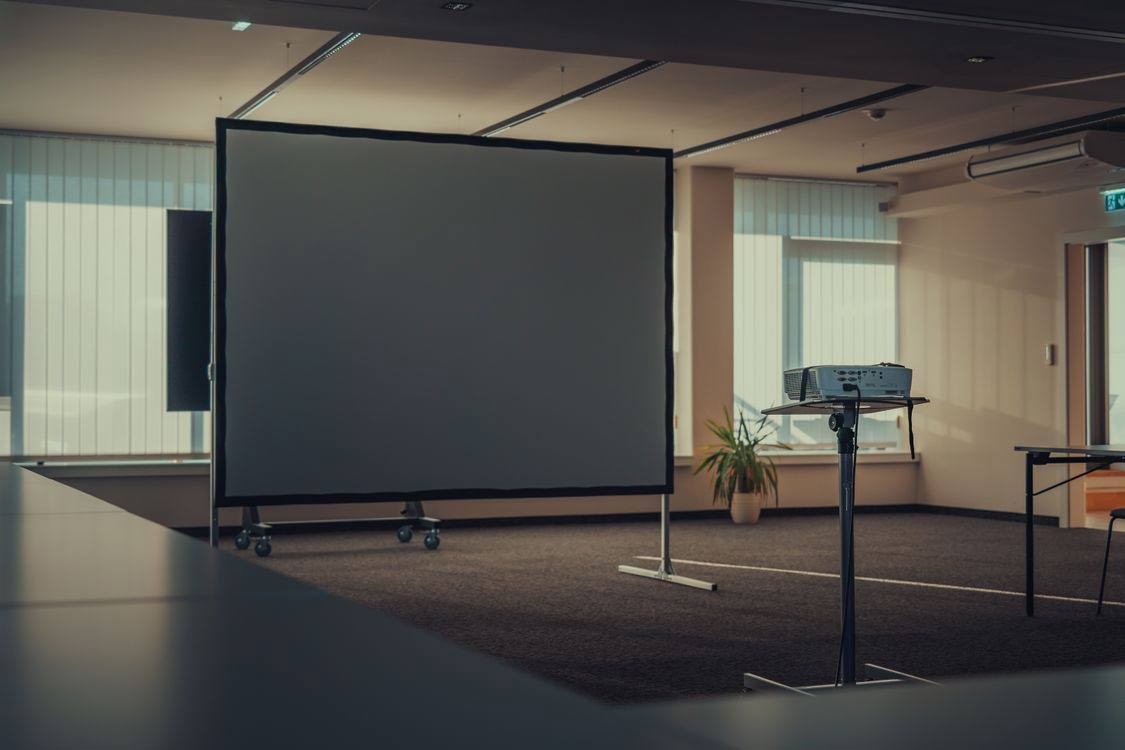 LED screens televisions and projectors for corporate conferences